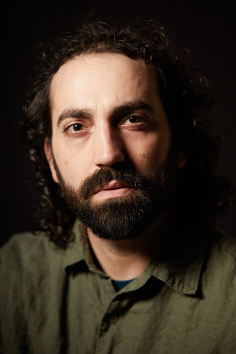 Headshot of Alex Romania